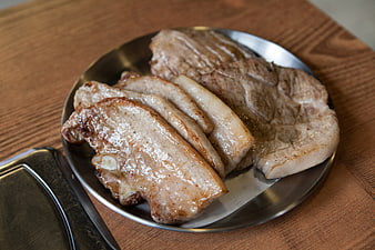Sliced Grilled Pork Belly on Metal Plate