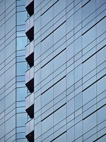 Modern Glass Office Building Facade with Geometric Pattern