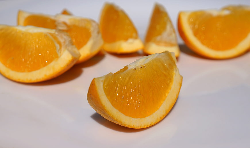 Fresh Orange Slices on White Background