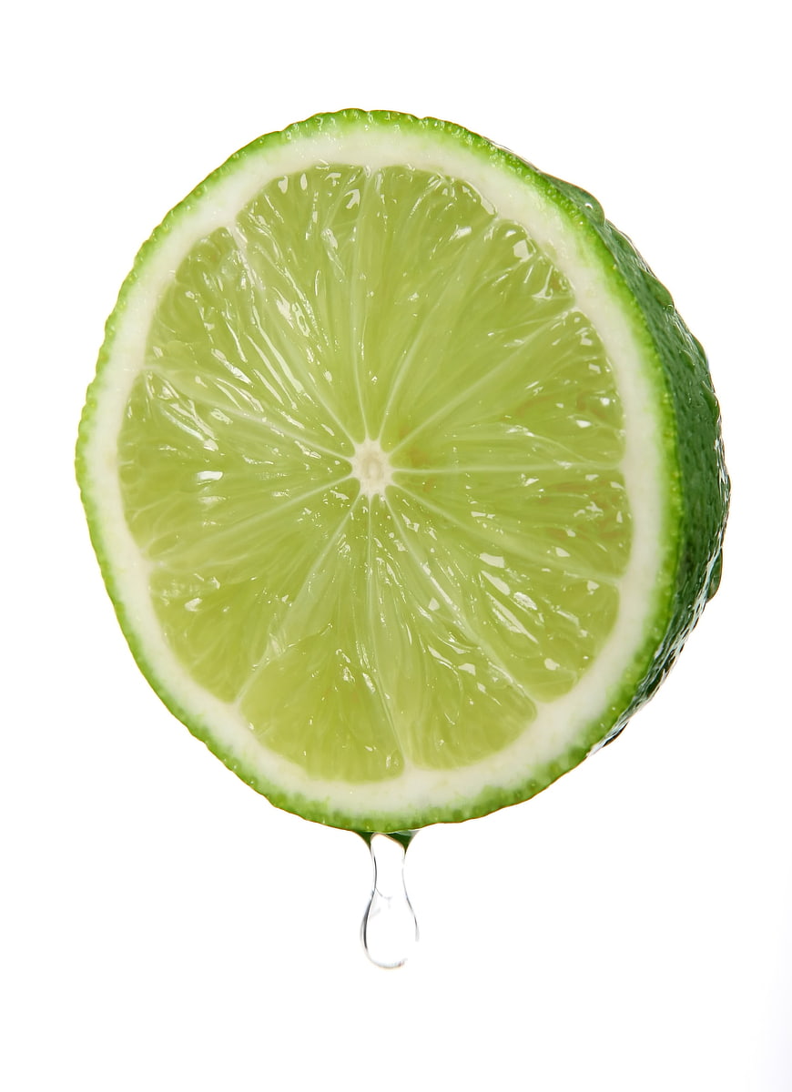 Fresh Sliced Lime with Water Droplet on White Background