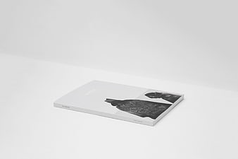 Minimalist White Book Mockup with Black and White Cover