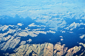 Aerial View of Snow-Capped Mountain Ranges