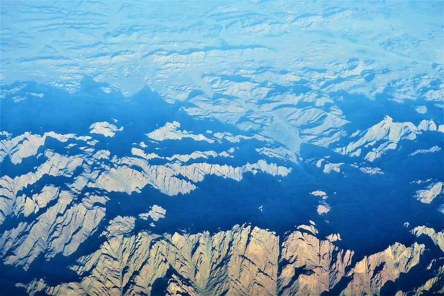 Aerial View of Snow-Capped Mountain Ranges