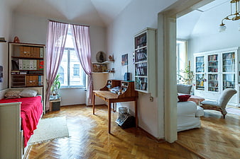 Bright Apartment Interior With Parquet Floor And Bookshelves