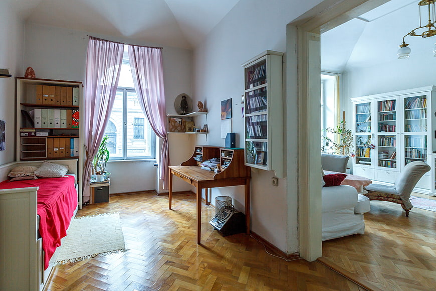 Bright Apartment Interior With Parquet Floor And Bookshelves