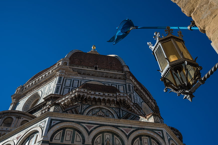 Florence Cathedral Dome and Street Lamp Against Blue Sky