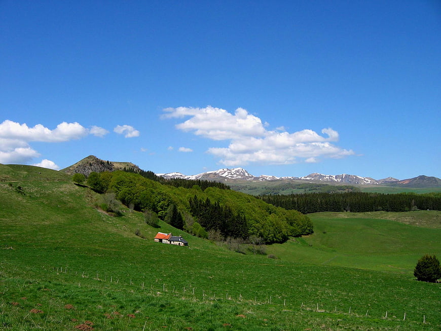 Scenic Green Hills and Snowy Mountains in Auvergne, France