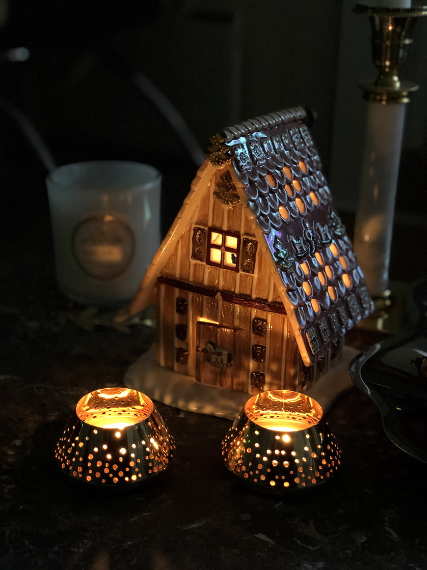 Glowing ceramic house candle holder with tea lights