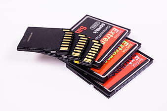 Stack of SanDisk CompactFlash Memory Cards on White Background