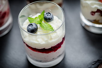Blueberry Parfait with Whipped Cream and Mint Garnish