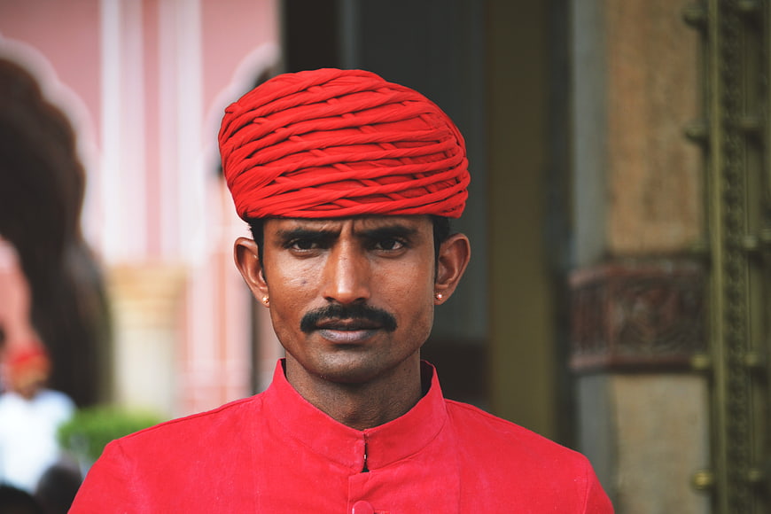 Portrait of Indian Man in Red Turban and Traditional Attire