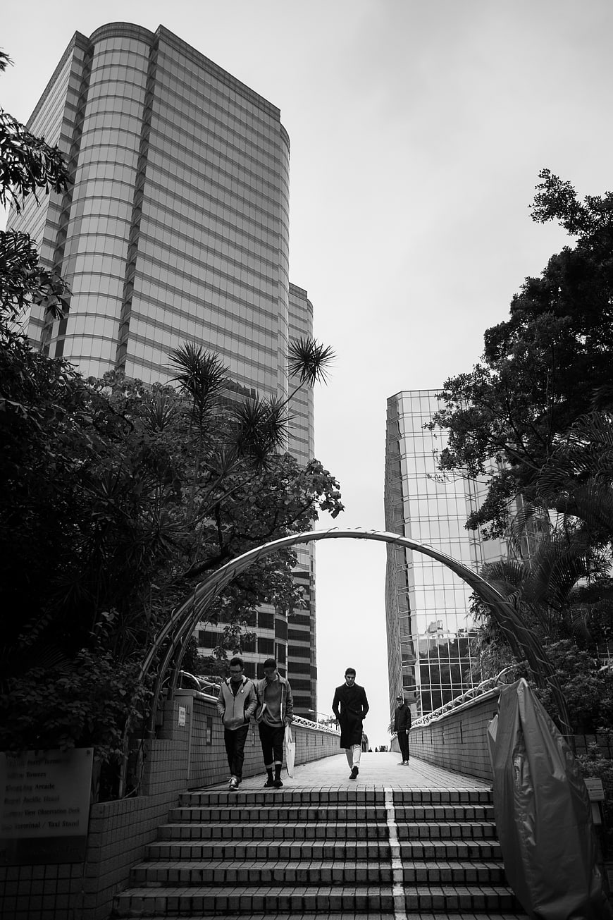Black and White Urban Architecture with Pedestrians on Stairs