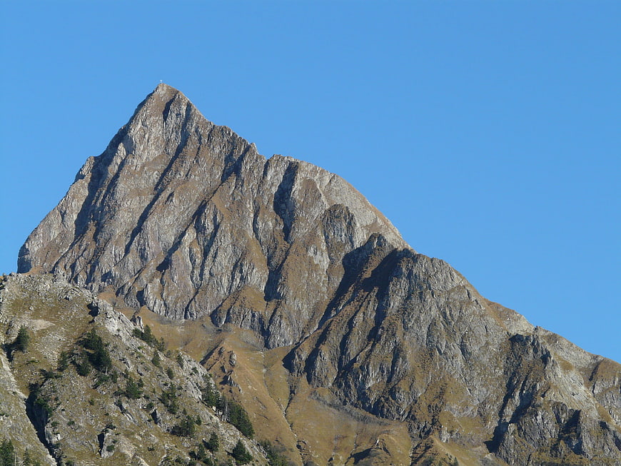 Rugged Rocky Mountain Peak Against Clear Blue Sky