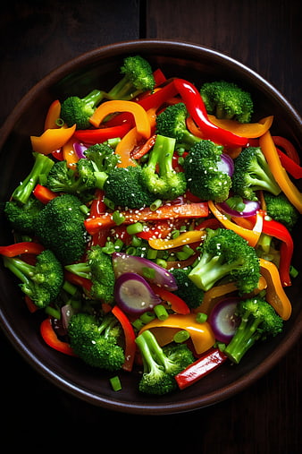 Colorful stir-fried broccoli and peppers in a bowl