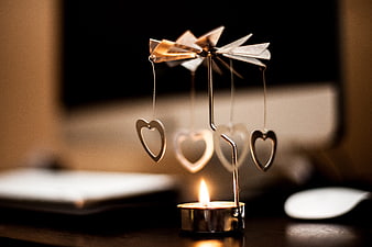 Metal dragonfly candle spinner with hanging hearts