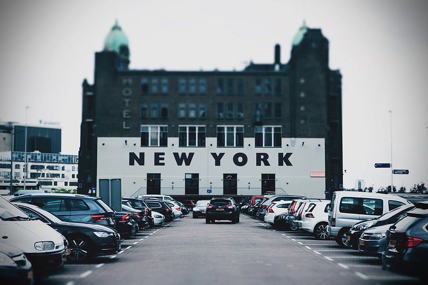 Hotel New York building with parking lot foreground
