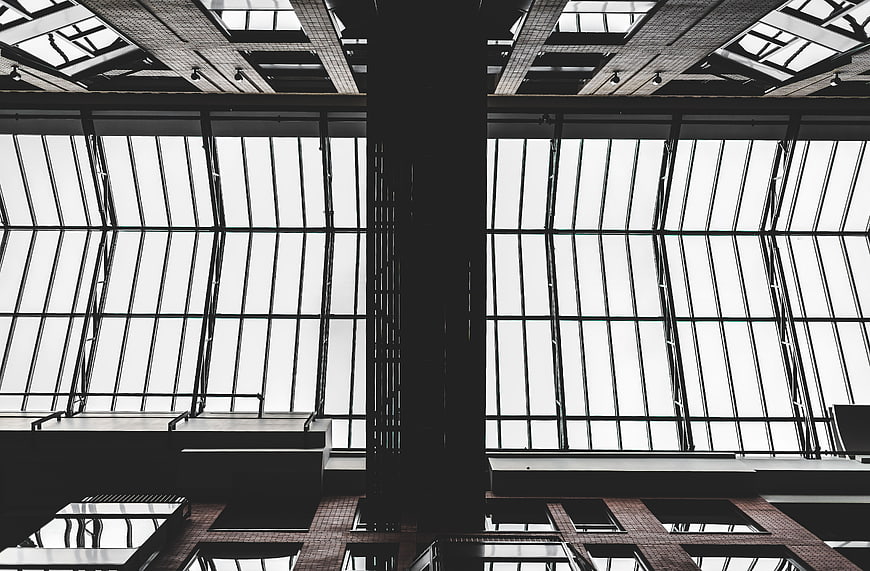 Black and white industrial architecture with large windows
