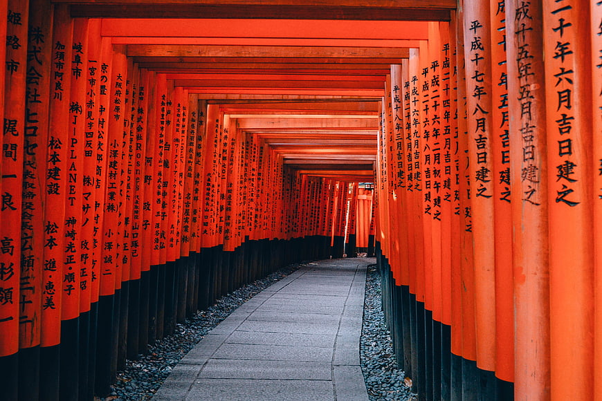 Pathway through red torii gates at Fushimi Inari Shrine in Kyoto