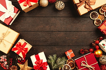 Christmas Gift Boxes Flat Lay With Copyspace On Dark Wood