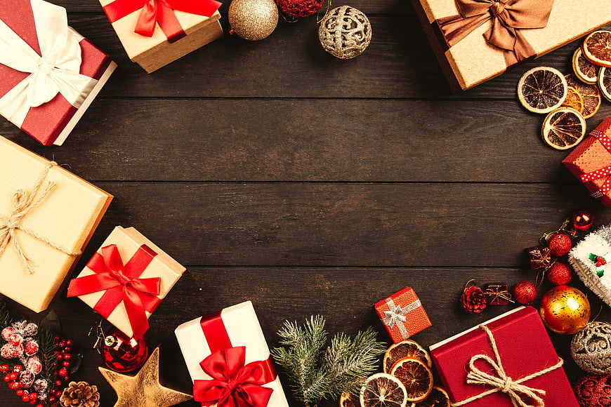 Christmas Gift Boxes Flat Lay With Copyspace On Dark Wood