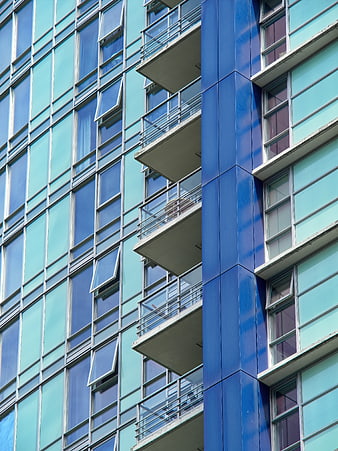 Modern Blue Apartment Building Facade with Balconies