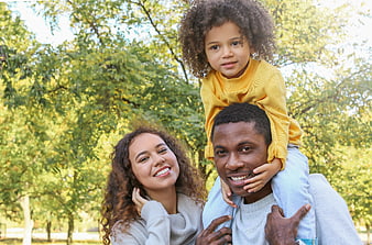 Happy African American Family Portrait in Park