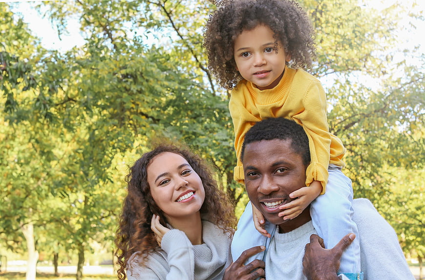 Happy African American Family Portrait in Park