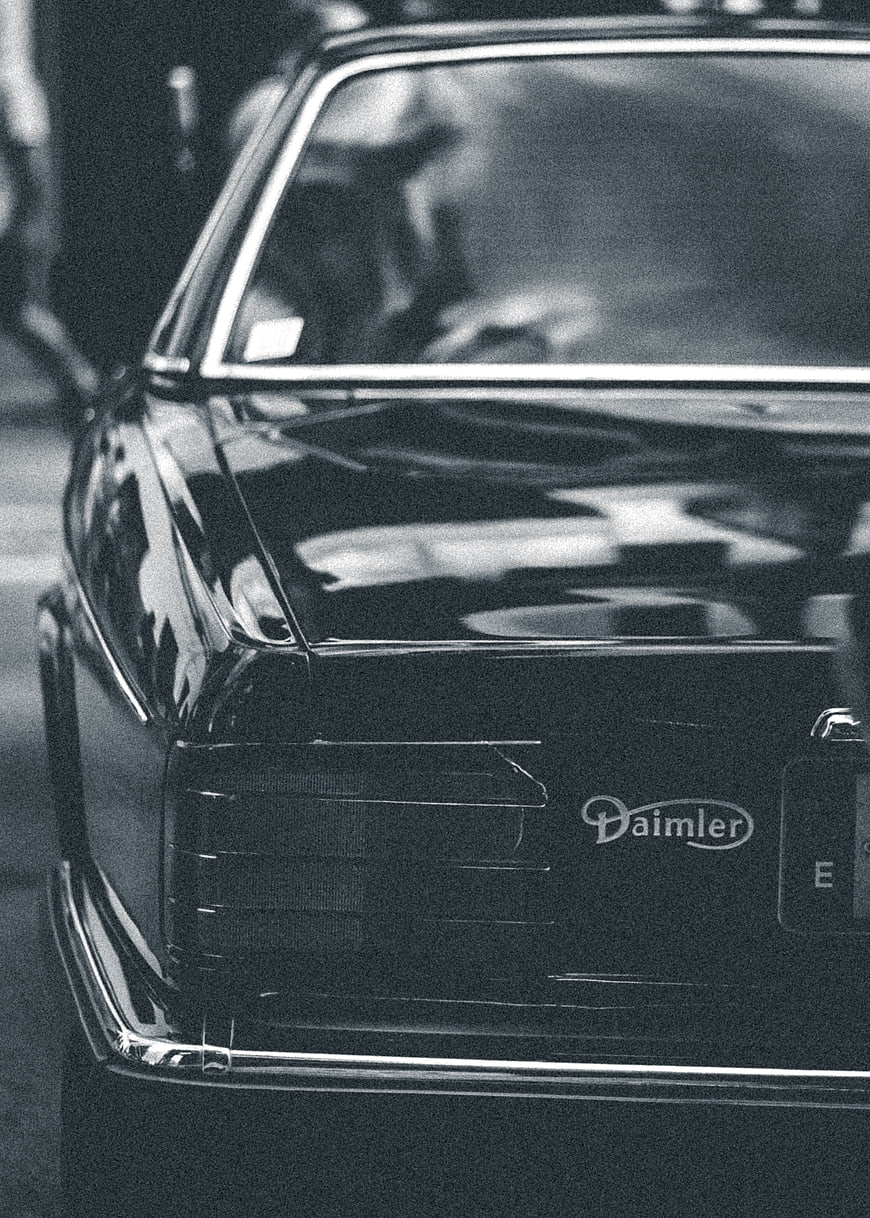 Close-up of vintage Daimler car rear in black and white