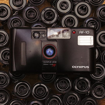 Vintage Olympus AF-10 Point and Shoot Camera on Film Rolls