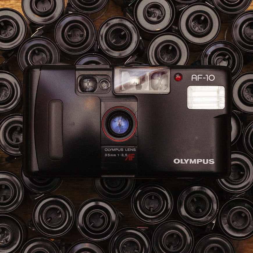 Vintage Olympus AF-10 Point and Shoot Camera on Film Rolls