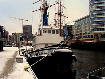 Historic Fairplay VII Ship Docked in Snowy Hamburg Harbor