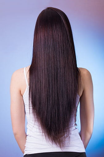 Rear view of woman with long straight dark hair