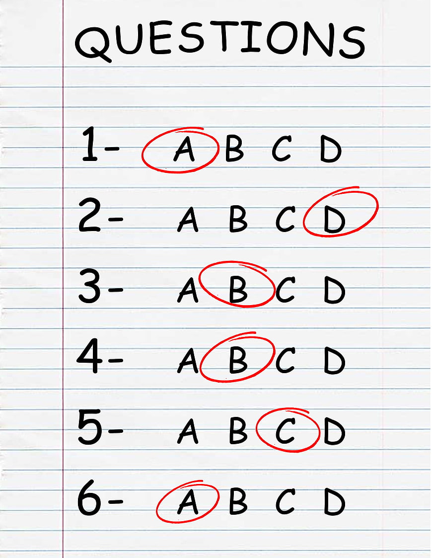 Handwritten multiple choice test answers on lined notebook paper