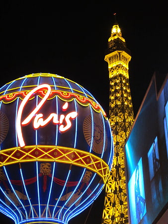 Paris Hotel Las Vegas Neon Sign and Eiffel Tower Replica at Night