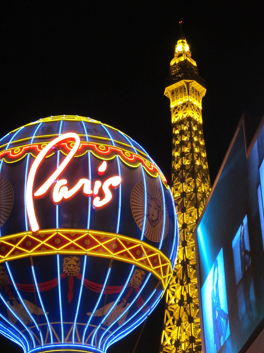 Paris Hotel Las Vegas Neon Sign and Eiffel Tower Replica at Night