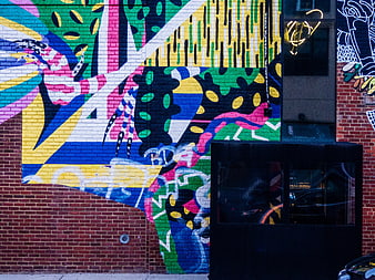 Vibrant Colorful Street Art Mural on Brick Wall