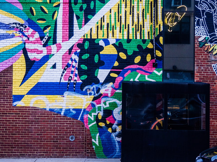 Vibrant Colorful Street Art Mural on Brick Wall