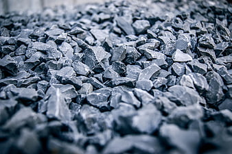 Close-up texture of gray gravel stones and rocks
