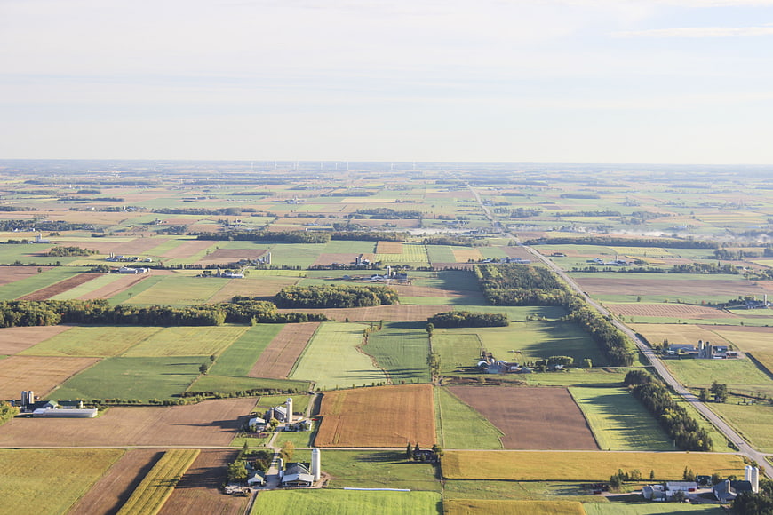 Aerial View of Patchwork Farmland and Rural Landscape