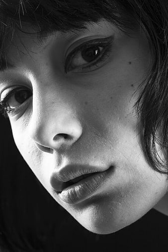 Close-up black and white portrait of woman's face