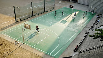 High Angle View of Outdoor Basketball Court with Players