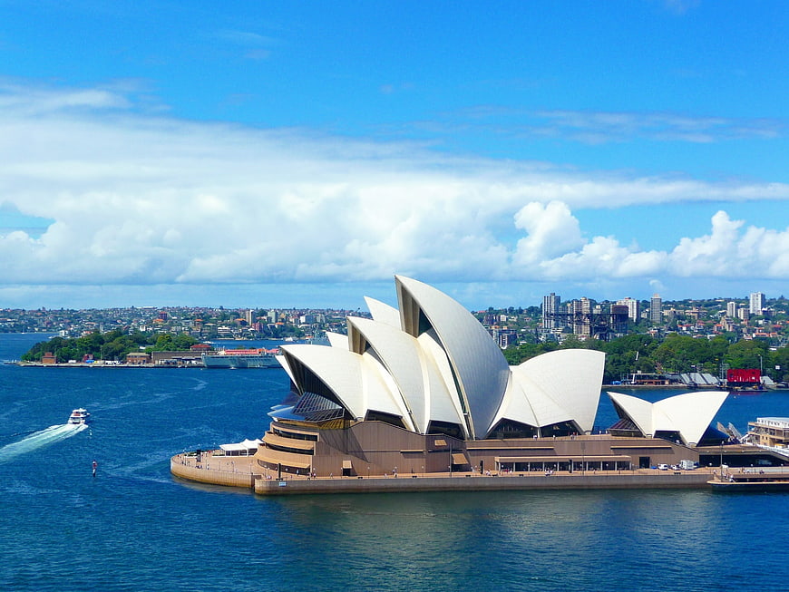 Sydney Opera House aerial view with harbor and city skyline