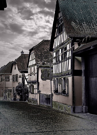 Historic Half-Timbered Houses On Cobblestone Street