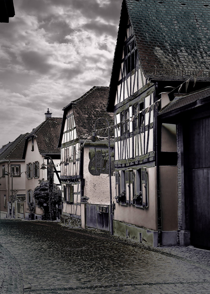 Historic Half-Timbered Houses On Cobblestone Street