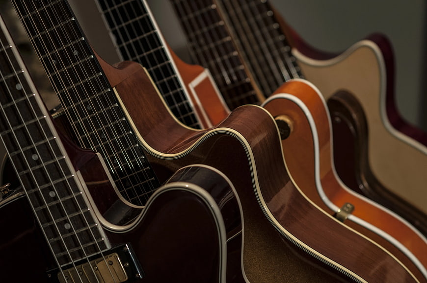 Close-up of acoustic guitars with shallow depth of field