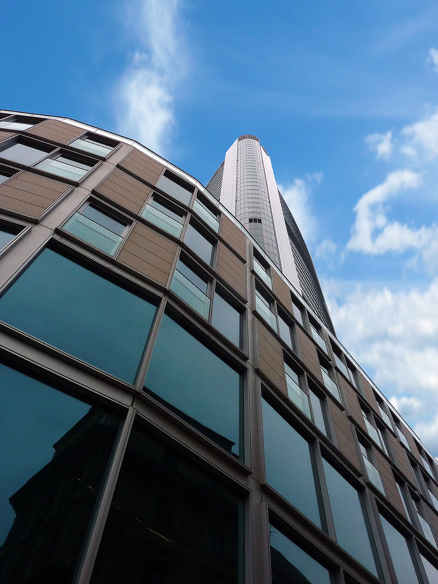Low angle view of modern brown and glass office building