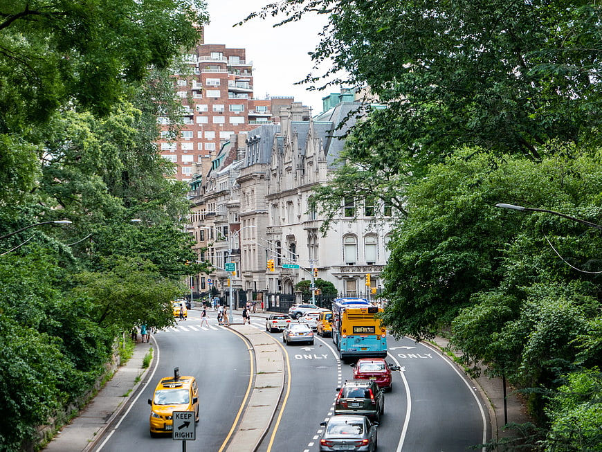 Yellow Taxi and City Bus on Park Avenue Manhattan