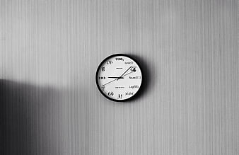 Minimalist Math Clock on Textured Wall