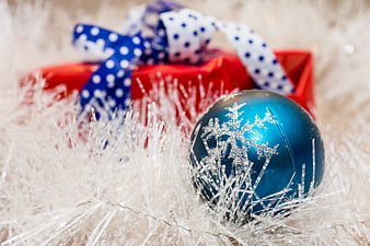 Blue Christmas Ornament and Red Gift Box in White Tinsel