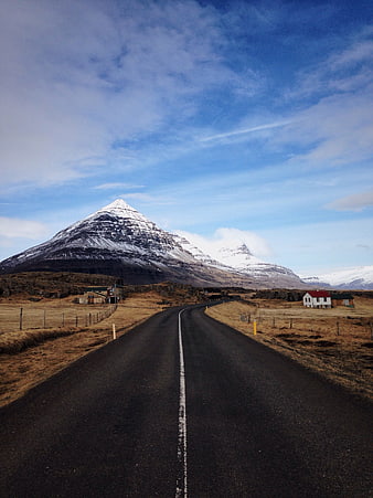 Icelandic Road Leading to Snow-Capped Kirkjufell Mountain